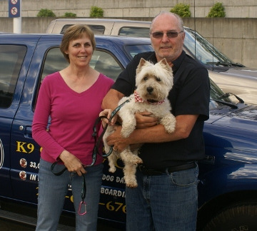 Rick and Heather with a small dog